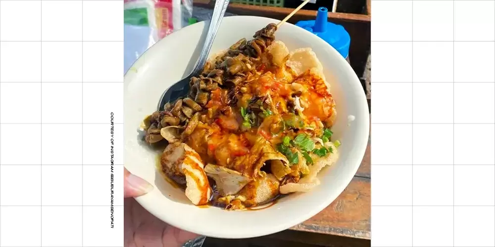 semangkuk bubur ayam tanpa diaduk